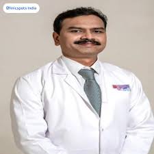 Dr. Kishore N L